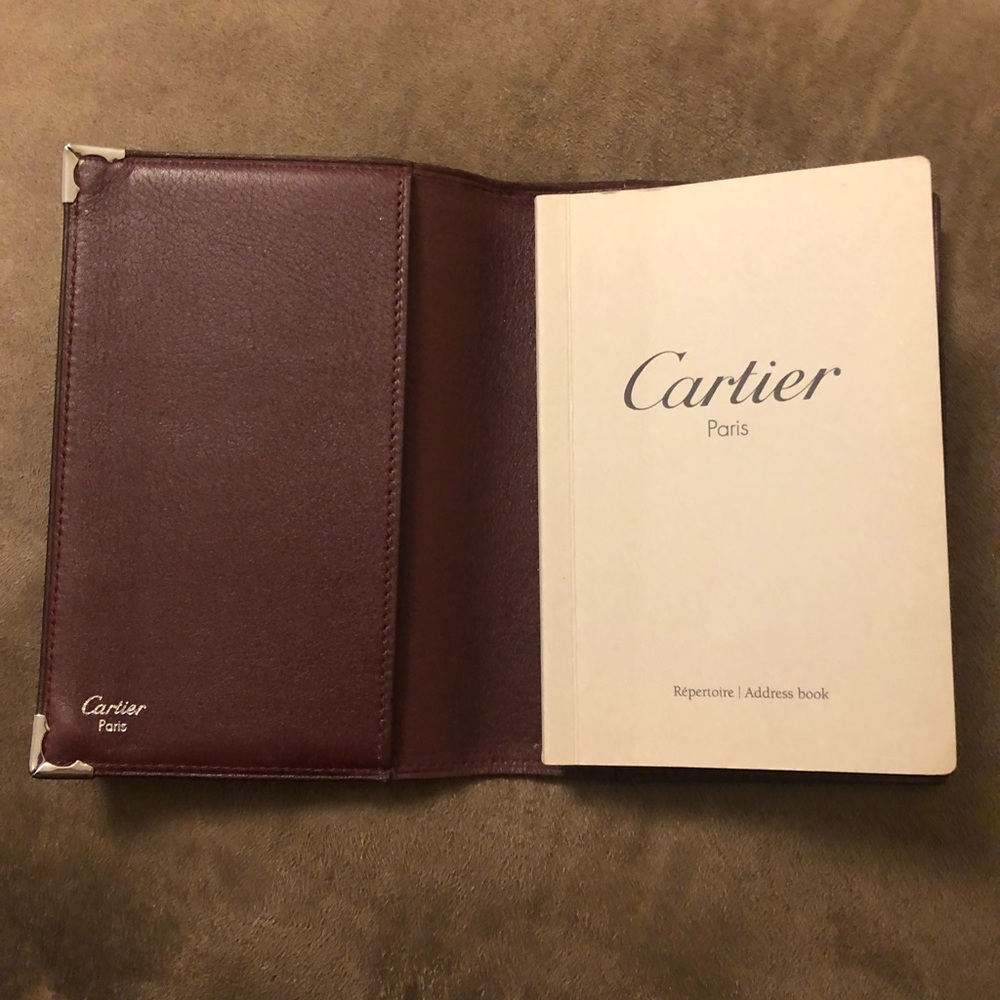 Cartier alphabet address book.100% genuine leather. With metal edges in front